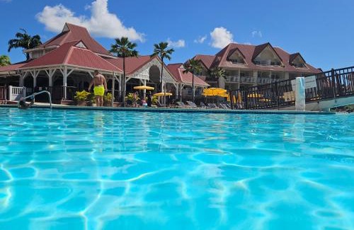 Gros Raisins Appartement | TI OASIS Dominica - Piscine et Plage à P&Vac Village-Club, 1 chambre 1 salon
