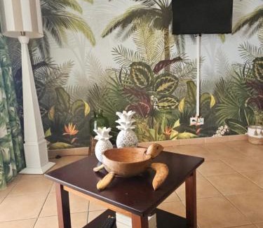 Gros Raisins Appartement | TI OASIS Dominica - Piscine et Plage à P&Vac Village-Club, 1 chambre 1 salon