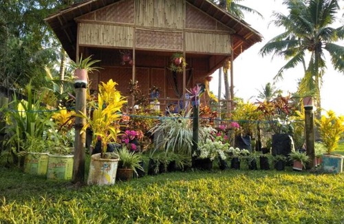 Gorontalo Cottage | Timuato Cottage par Harry & Mimin. Situé à Gorontalo près du lac de limboto.
