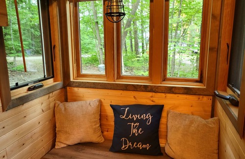 Nevis Maison | Tiny bungalow secluded in the woods with lake view. Pets accepted!