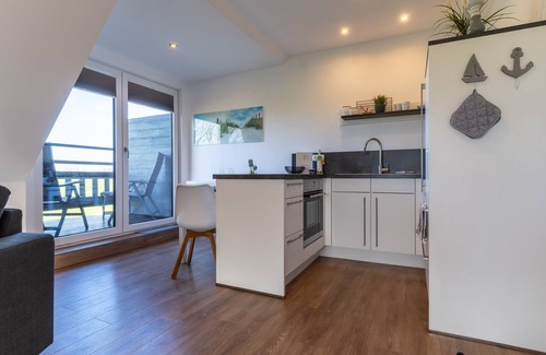 Tumlauer Koog Appartement | Top-equipped thatched-roof holiday apartment with far-reaching views just outside SPO