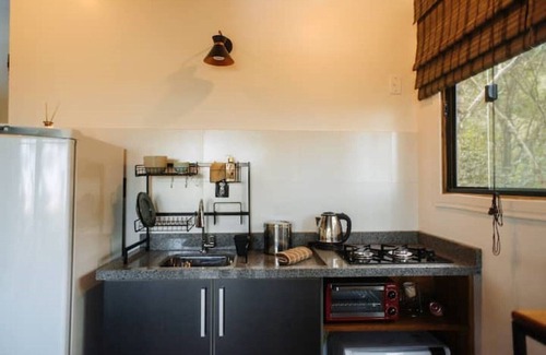 Garopaba Maison | Tourmaline studio, views of the sea, dunes and lagoon.