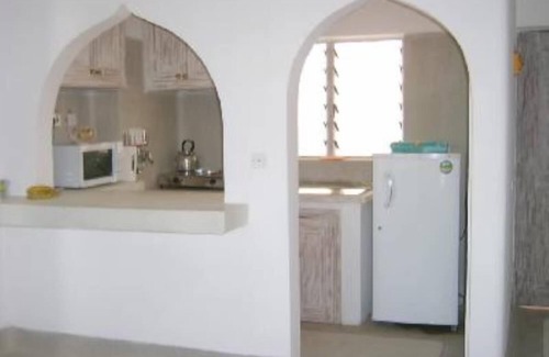 Malindi Appartement | Plage/ Ville/confortable appartement,gym,piscine,chaises longues, Jardin