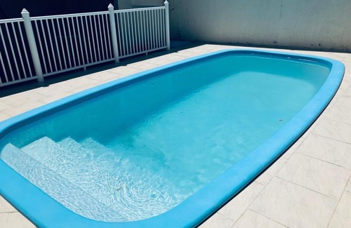 Barra de Ibiraquera Appartement | Townhouse composta por 4 triplex duas suítes a duas quadras do mar