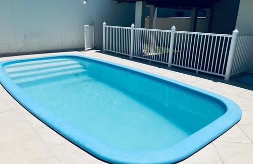 Barra de Ibiraquera Appartement | Townhouse composta por 4 triplex duas suítes a duas quadras do mar