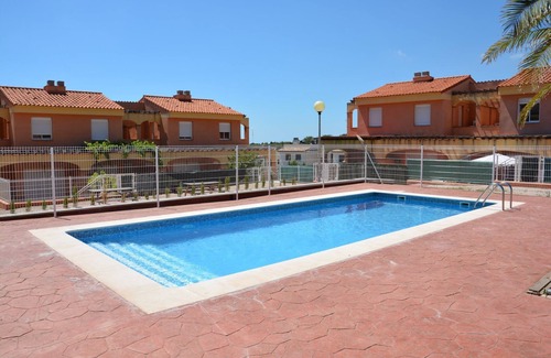 Miami Platja Maison | Maison de ville avec jardin privé et piscine commune à Casalot, Miami Playa
