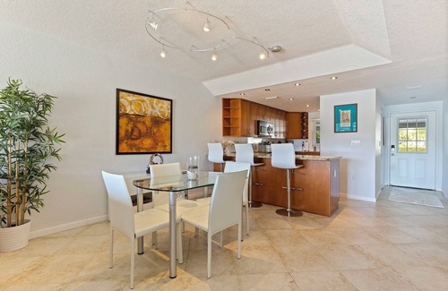 Capri Isle Copropriété | Treasure Island Waterfront Condo on Peaceful Isle of Capri