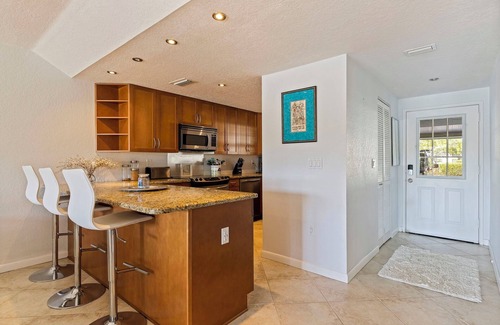 Capri Isle Copropriété | Treasure Island Waterfront Condo on Peaceful Isle of Capri