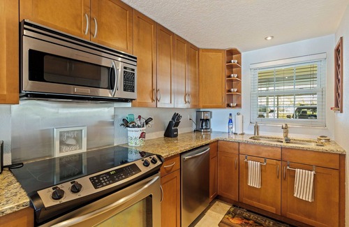 Capri Isle Copropriété | Treasure Island Waterfront Condo on Peaceful Isle of Capri