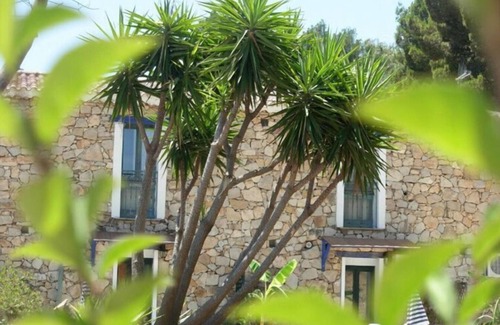 Gonnesa Appartement | Triple room with shared pool and kitchen, Wi-Fi and air conditioning