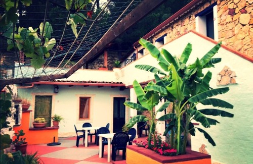 Gonnesa Appartement | Triple room with shared pool and kitchen, Wi-Fi and air conditioning