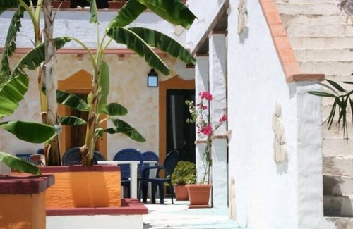 Gonnesa Appartement | Triple room with shared pool and kitchen, Wi-Fi and air conditioning