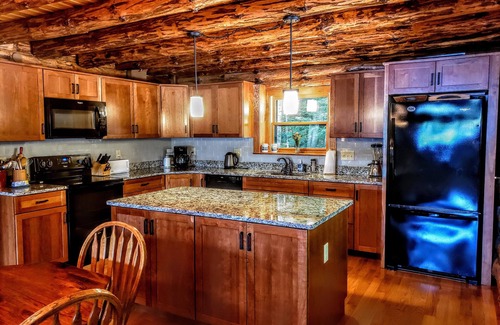 Mirror Lake Maison | Tuftonboro Waterfront Home on Winnipesaukee with Sandy Beach sleeping 10
