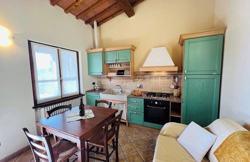 Pieve Santo Stefano Autre | Tuscan getaway: pool, lake view & warm family hospitality in organic farmhouse