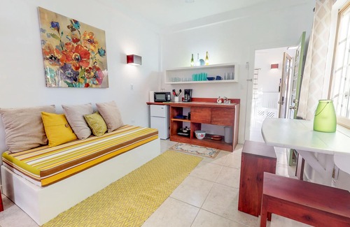 Caye Caulker Maison | Deux studios tropicaux ouverts avec un excellent emplacement à deux pas de la plage et des restaurants!