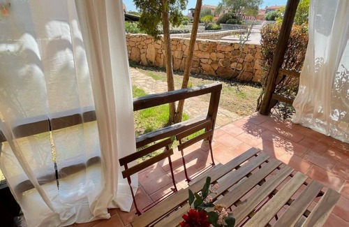 Porto Pollo Appartement | Two-room apartment for 4 people with garden and patio located in the heart of Porto Pollo.