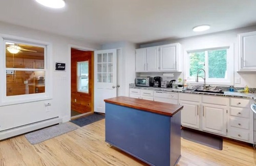 Alton Bay Maison | Two updated lakefront homes - dock with boat slip, game room, & screened porch