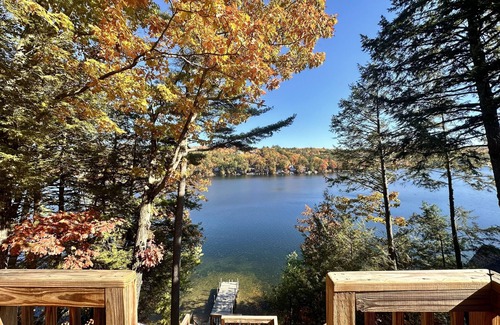 Alton Bay Maison | Two updated lakefront homes - dock with boat slip, game room, & screened porch