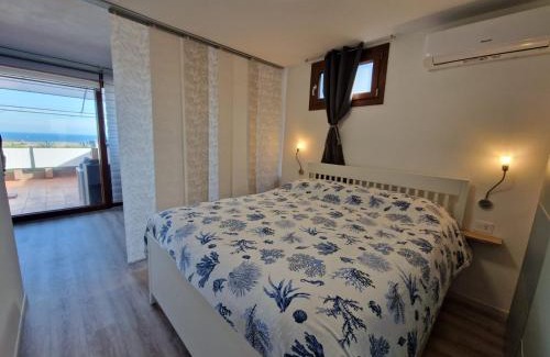 Cugnana Verde Appartement | Una finestra vista mare in Costa Smeralda