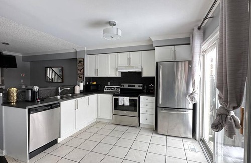 West Oak Trails Maison | Unique 3 bedroom townhouse with 2 parking spaces.