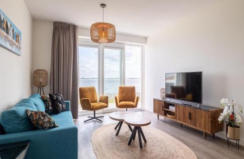 Sint-Annaland Appartement | Unique apartment, located on the Oosterschelde and marina of Sint Annaland