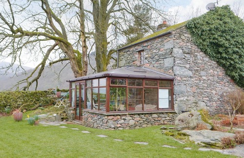 Ulpha Cottage | Unique cottage with a cosy living room set around an Inglenook fireplace.