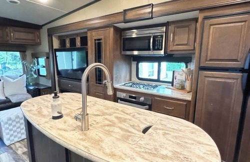 Bonney Lake Maison | Unique stay where Camper meets resort. Lake front and countless amenities.