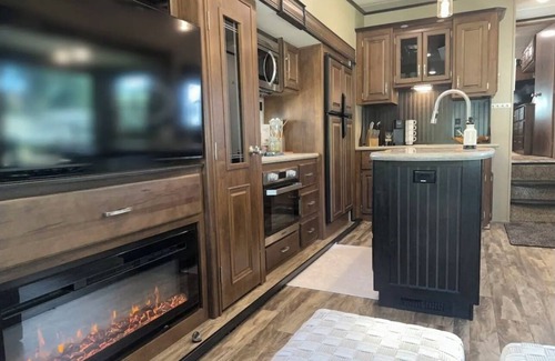 Bonney Lake Maison | Unique stay where Camper meets resort. Lake front and countless amenities.