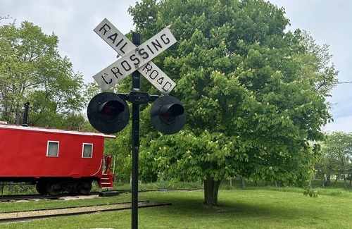 Orange Prairie Cottage | Uniquely Quaint Santa Fe Train Caboose 2