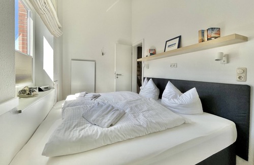Langeoog Appartement | Unser Lichtdurchflutetes Sonnennüst im Obergeschoß am Langeooger Ortsrand