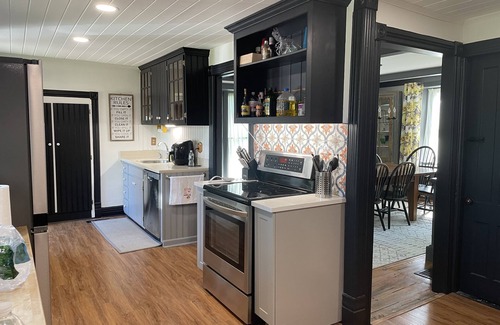Hartwick Maison | Updated historic home with barn, great views, and EV charger for electric cars!