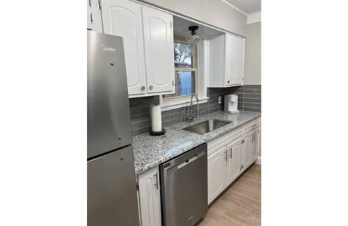 Guymon Maison | Updated three bedroom home across from park