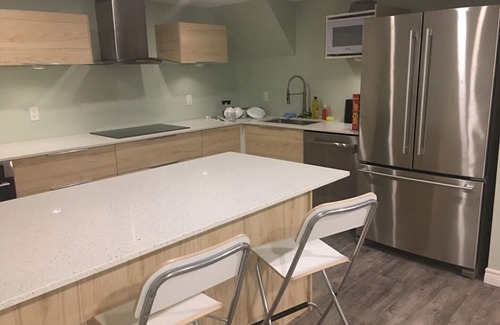 Highland Maison | Haut de gamme Appartement Sous-sol 2 Chambre
