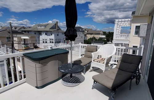 North End Copropriété | Condo haut de gamme au 2e étage situé dans un quartier recherché avec vue sur la plage