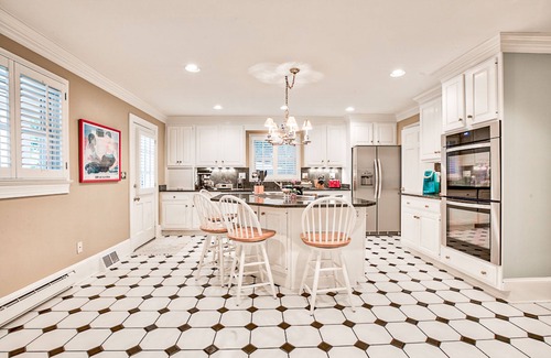 Historic District Maison | Upscale multi-level retro home with large deck, washer/dryer, and lovely patio