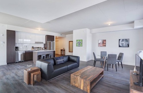 Laval Appartement | Urban 2BR Escape In-suite Laundry and Terrace