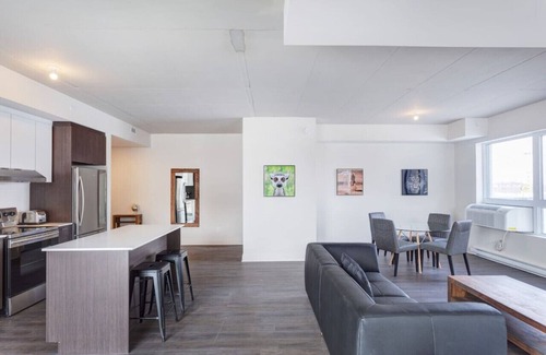 Laval Appartement | Urban 2BR Escape In-suite Laundry and Terrace