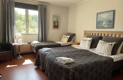 Vastra Hudiksvall Hôtel | Värdshuset Glada Hudik