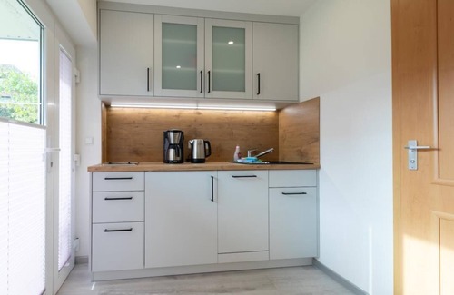 Warnemuende Appartement | Vacation apartment "Luv" with terrace, parking on the property