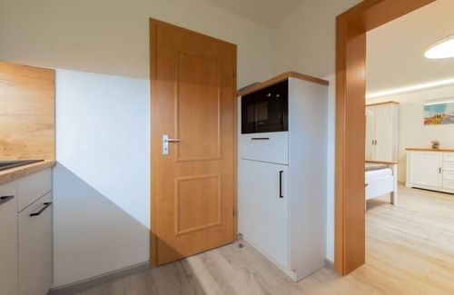 Warnemuende Appartement | Vacation apartment "Luv" with terrace, parking on the property
