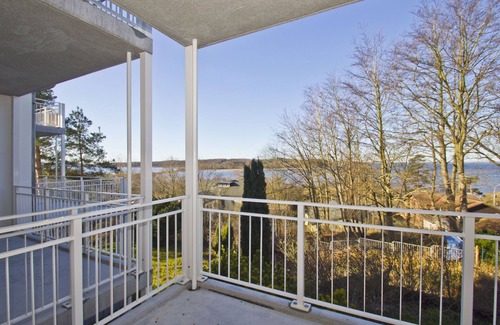 Lietzow Appartement | Vacation apartment with balcony, fireplace and sauna - Ferienresidenz Zwei Bodden FeWo 2-9