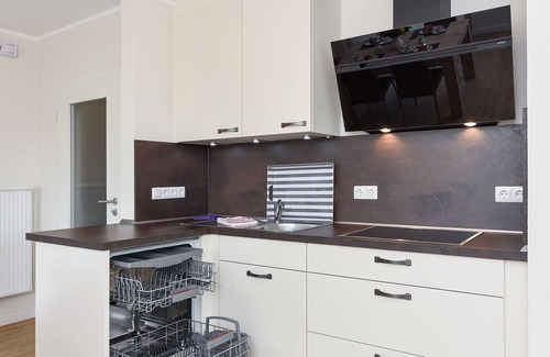 Neuharlingersiel Appartement | Appartement en haut à droite - Maison tombée ancre