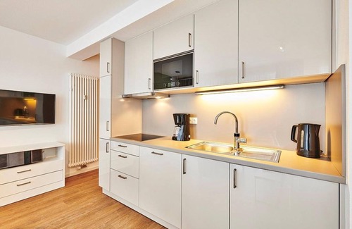 Bensersiel Appartement | Vacation apartment close to the beach with large balcony incl. use of swimming pool & sauna - Deichhäuser Anna
