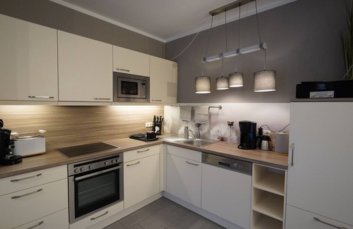 Serrahn Appartement | Vacation apartment "Kranich" on Lake Krakow with terrace and playroom