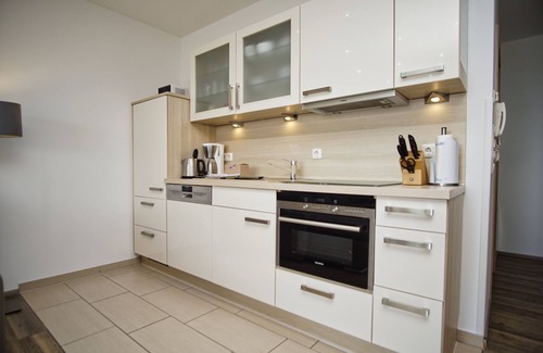 Lauterbach Appartement | Vacation apartment near the harbor with sea view - Hafenresidenz Lauterbach FeWo 2-2