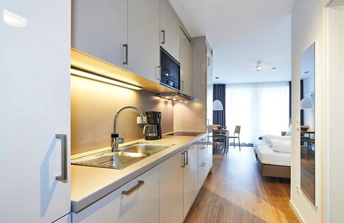 Bensersiel Appartement | Vacation apartment near the beach with terrace incl. free use of swimming pool & sauna - Deichhäuser Anna