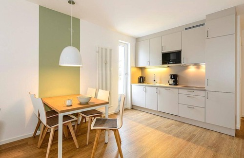 Bensersiel Appartement | Vacation apartment with terrace incl. free use of sauna area & swimming pool - Deichhäuser Anna