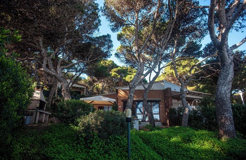 Porto Pino Villa | Maison de vacances 'Fronte Mare Al Porticciolo' avec vue sur la mer, barbecue et Wi-Fi