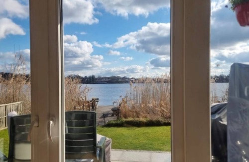 Moelln Maison | Vacation home Mölln am Ziegelsee bathing jetty swimming fishing boat 3 persons dog