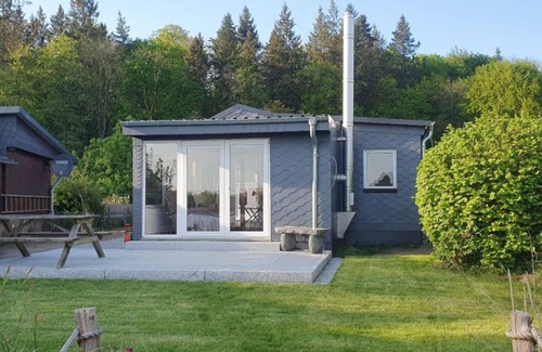 Moelln Maison | Vacation home Mölln am Ziegelsee bathing jetty swimming fishing boat 3 persons dog